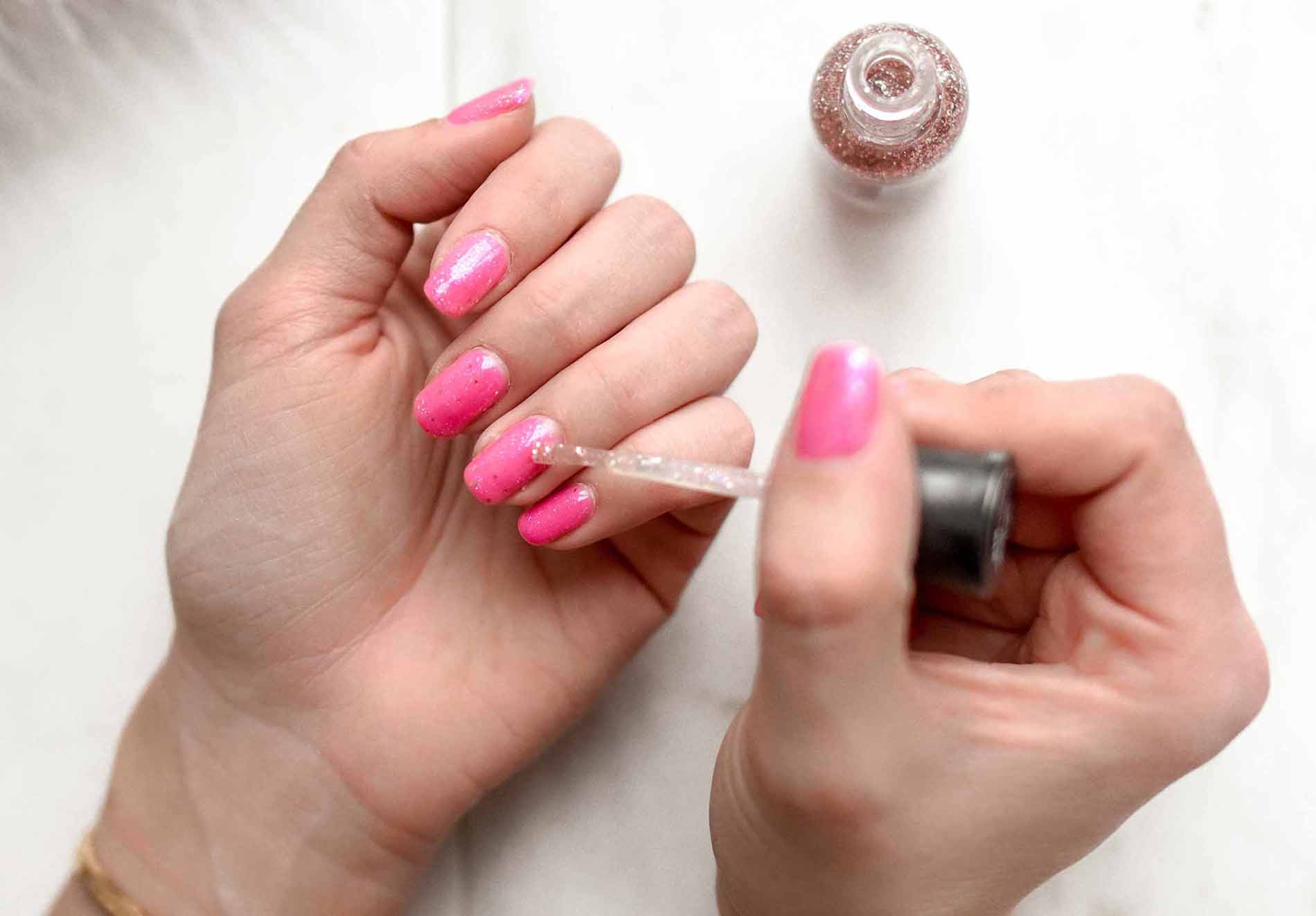 Woman Painting Her Nails Woman Painting Her Nails